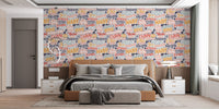 Artistic word pattern wallpaper mural in muted retro color scheme.