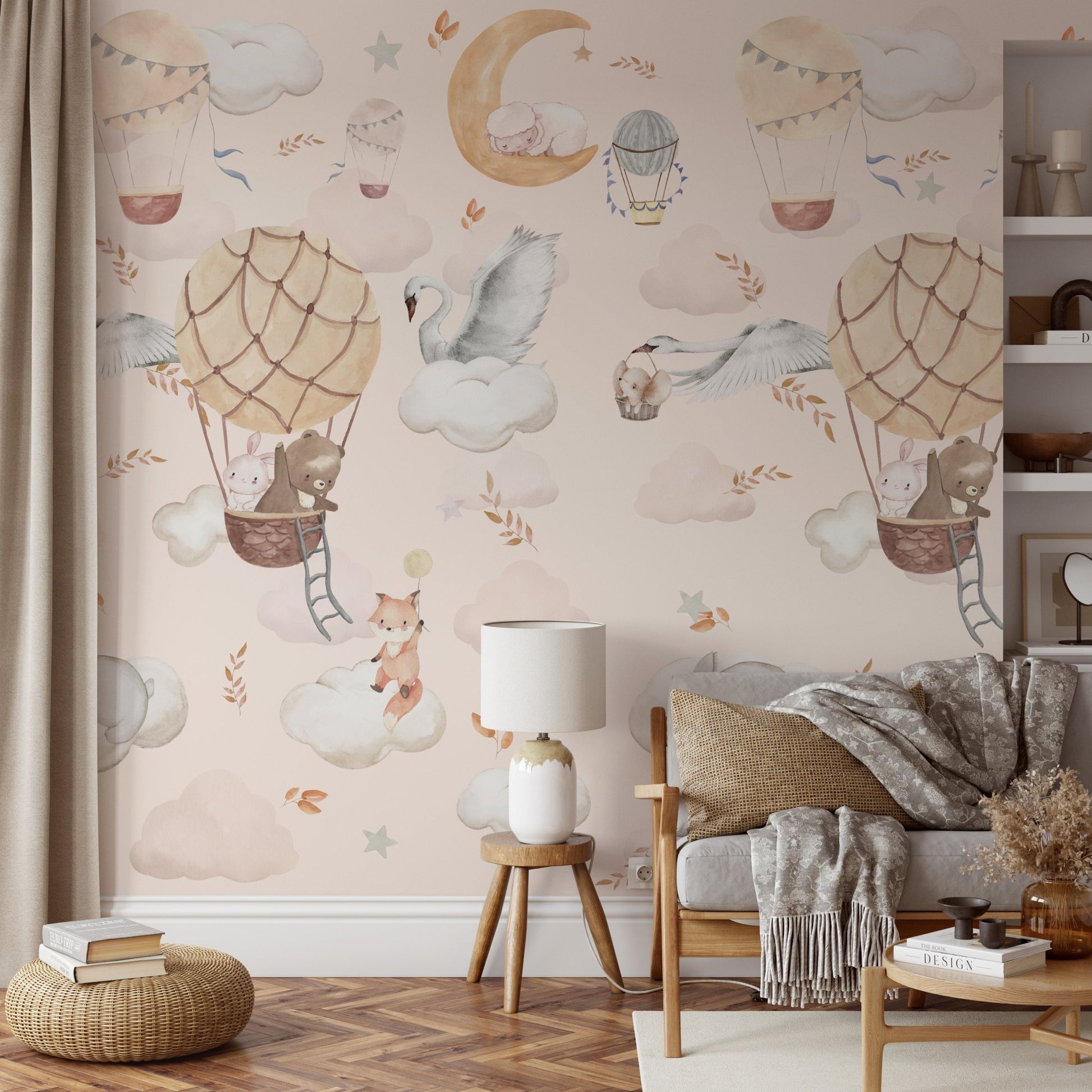 Soft peach wall mural with grey hot air balloons and white fluffy cloud patterns.