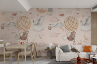 Living room wall mural with a crescent moon and tan balloon pattern.
