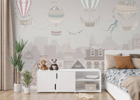 Soft grey cityscape wall mural with floating balloon illustration.