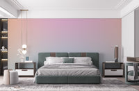 Dreamy pastel gradient mural wallpaper in pink and blue color blend.