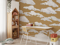 Mustard sky wallpaper with soft white cloud brushstroke wall mural.
