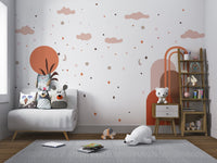 Kids sky theme wall mural with soft orange sun and scattered star shapes.