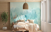 Small bedroom featuring a teal tree wall mural and hanging wicker lamp.