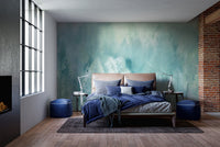 Bedroom setup with dark blue bedding and Dreamy Tree Landscape Wall Murals.