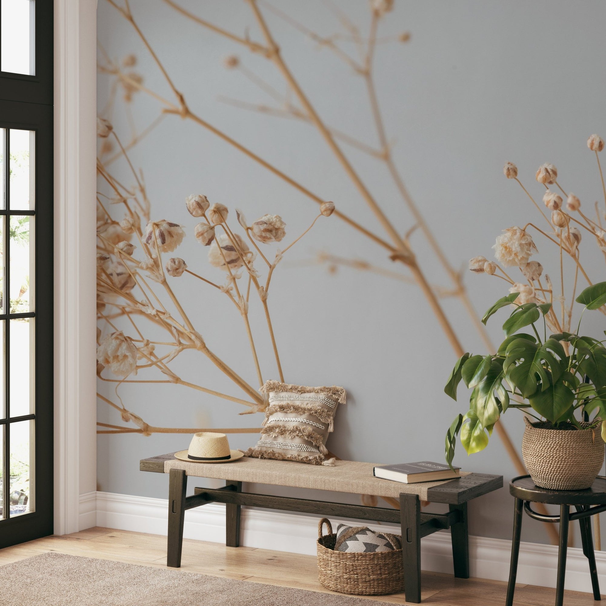 Dried floral botanical wallpaper with delicate beige stems on gray.