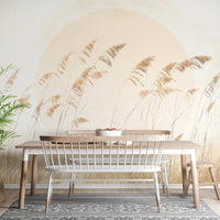Minimalist wall mural featuring tall grass silhouettes and a sun.