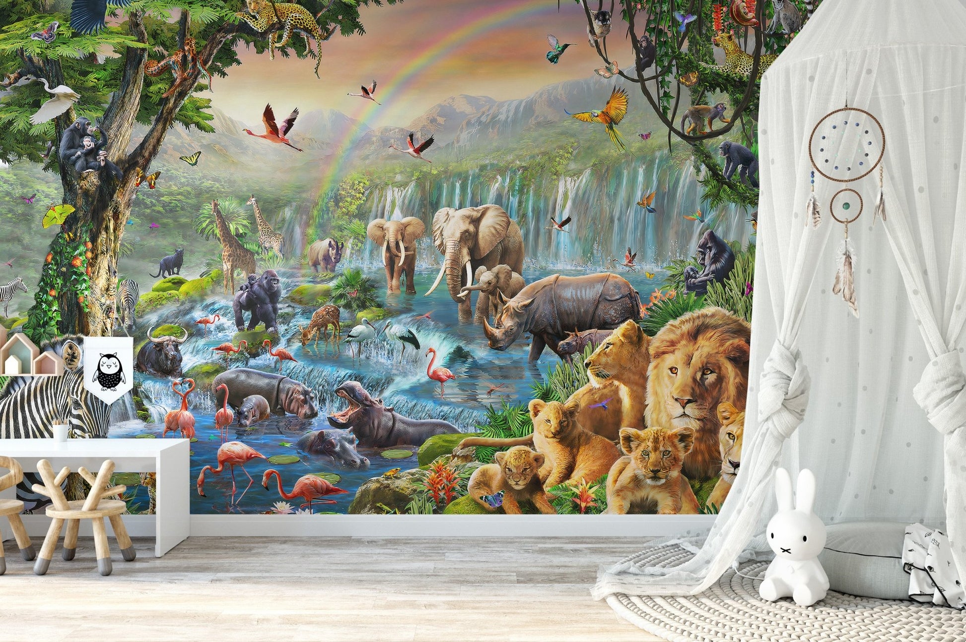 Dynamic Animal wall mural with a white canopy and dreamcatcher in kids room.