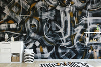 Artistic brushstroke pattern wall mural in dark neutral tones.