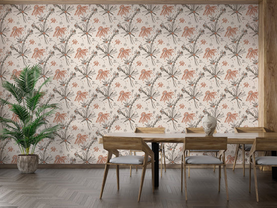 Large wallpaper with terracotta botanical sketches in a dining room with wooden chairs.
