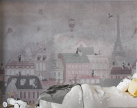 Soft pink Paris cityscape wall mural with black cats for kids bedroom styling.