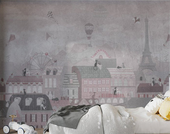 Soft pink Paris cityscape wall mural with black cats for kids bedroom styling.