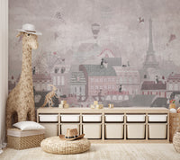 Grey and pink city skyline wall mural with cat silhouettes for nursery.