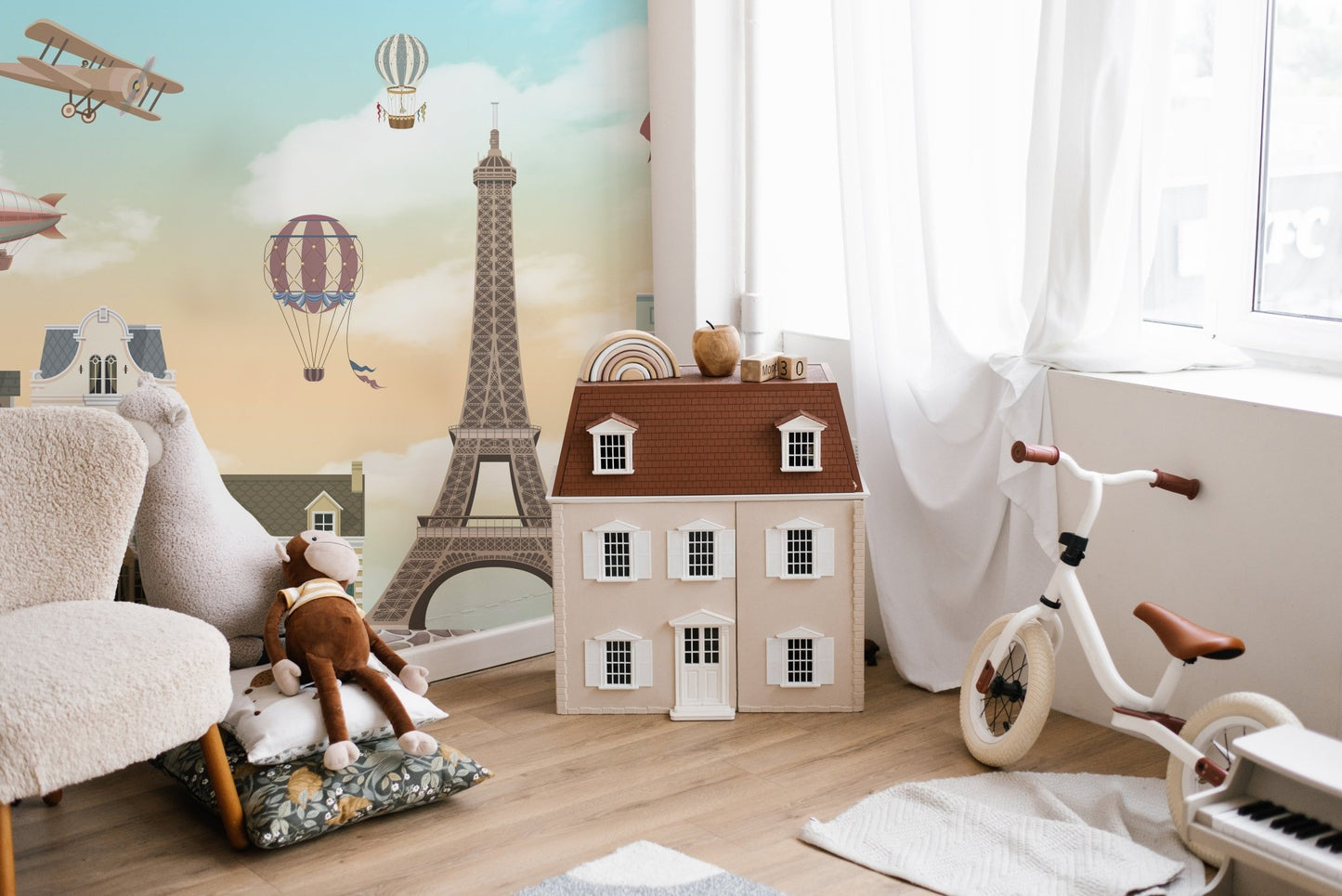 City-Themed Eiffel Tower Wall Mural in minimalist children's play area.
