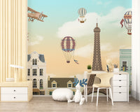 Study area featuring city architecture and Eiffel Tower wall mural.