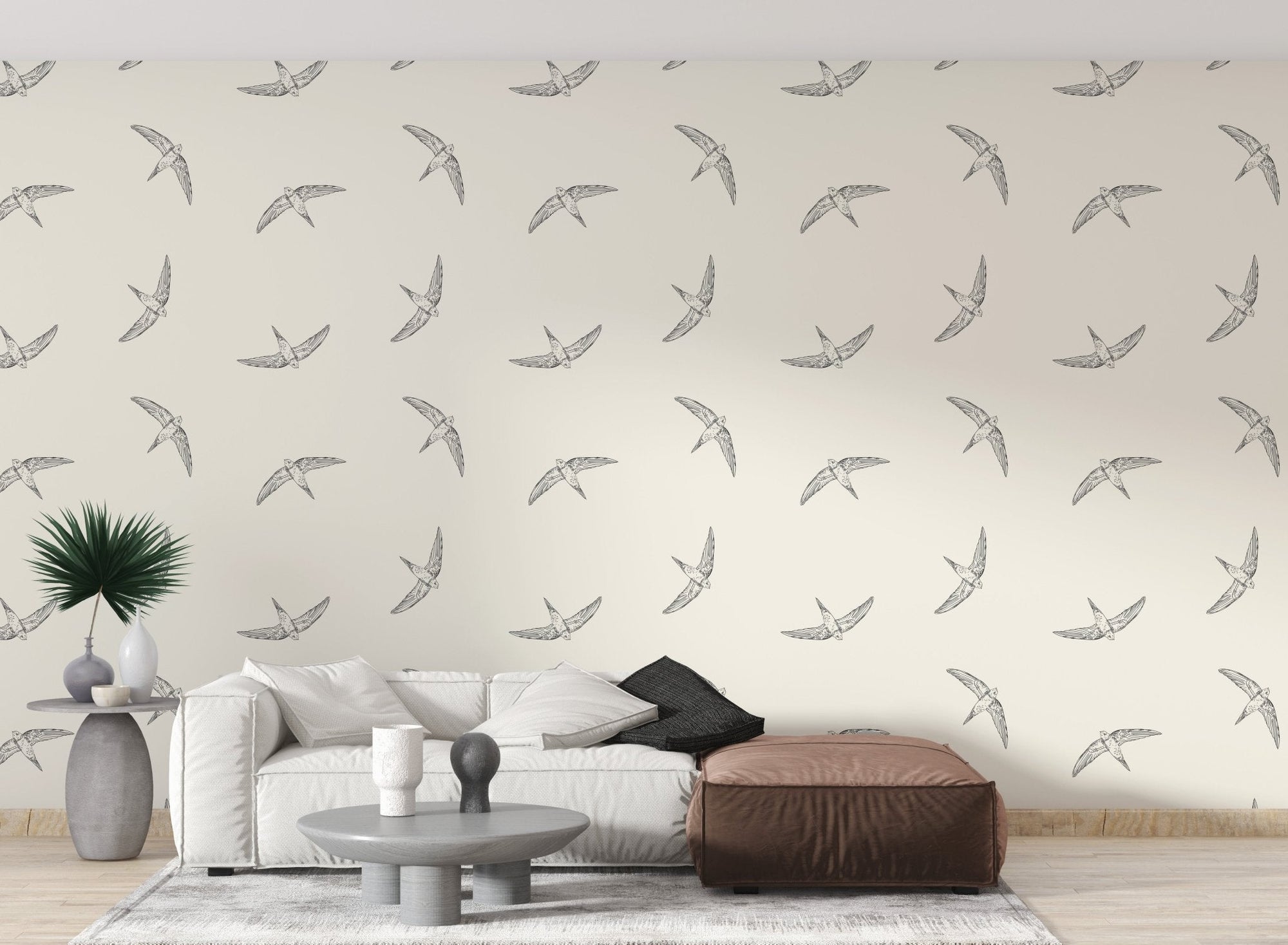 Minimal flying bird pattern wallpaper in soft beige color palette for living room.
