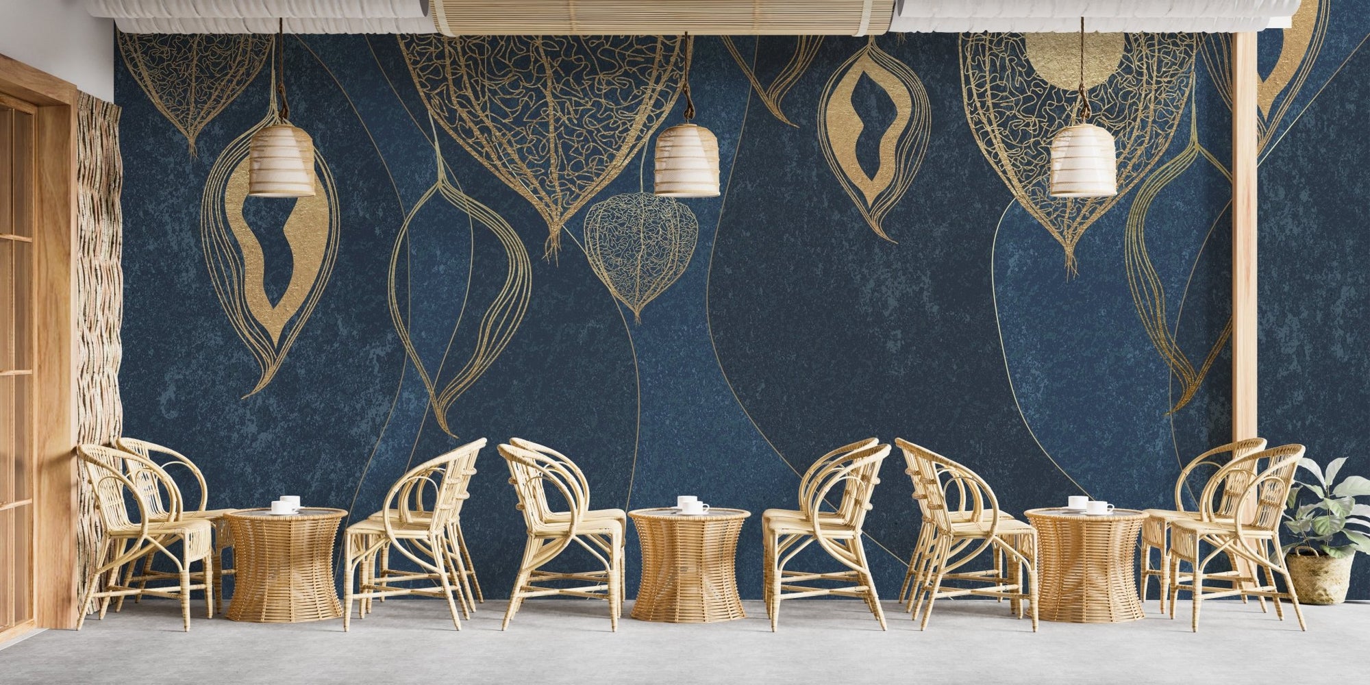 Elegant Golden Leaves wall mural in a modern cafe with wooden seating.