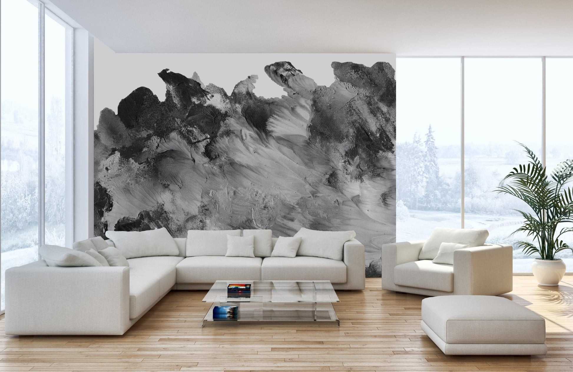 Bright living room with a red cushion on the sofa and a dark grayscale wall mural.