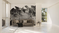 Large living area with a neutral sofa and a textured grayscale wall mural.