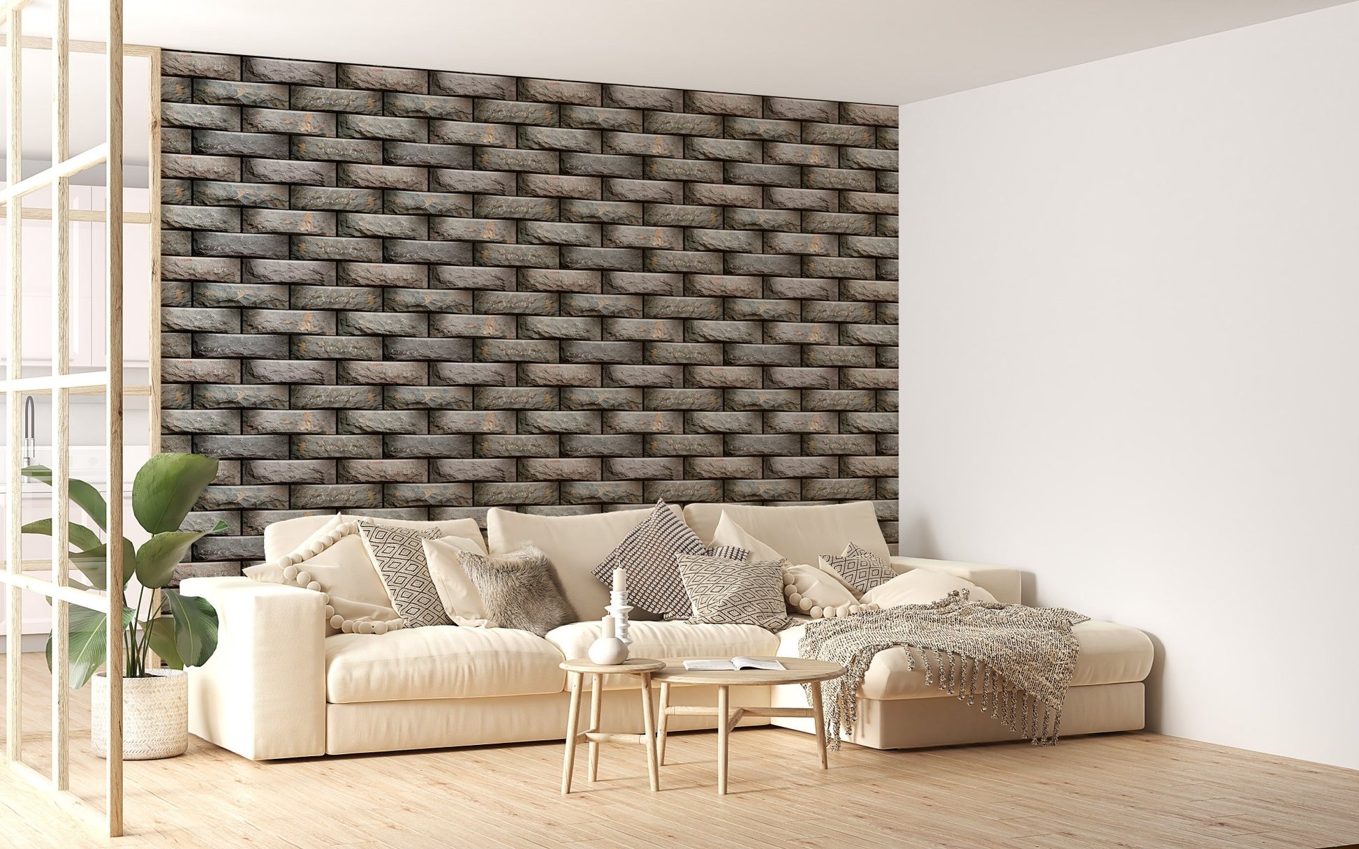Modern sofa set against a grey geometric modules wallpaper in a sunlit room.