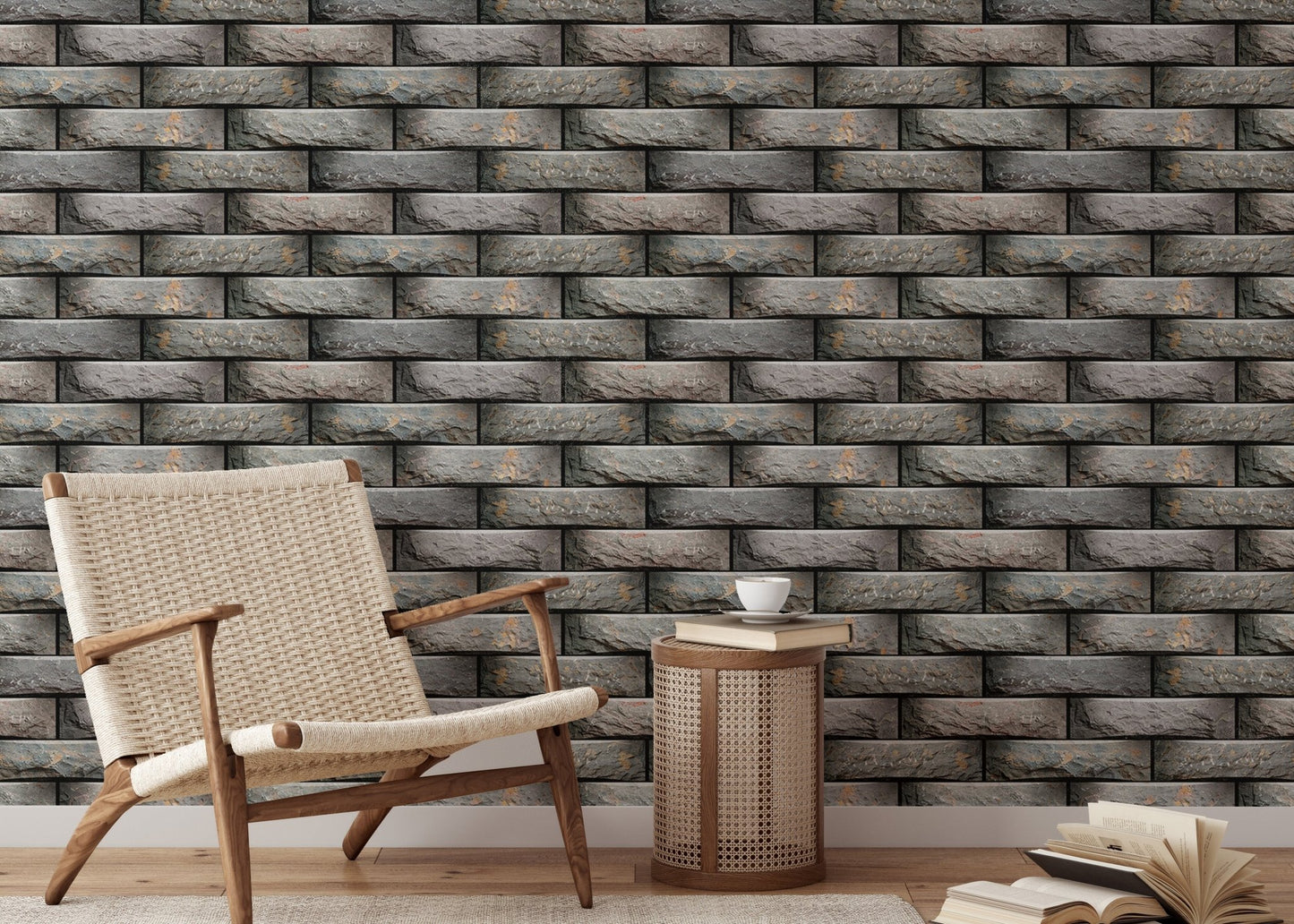 Reading nook with neutral stone pattern wallpaper and a wooden armchair.