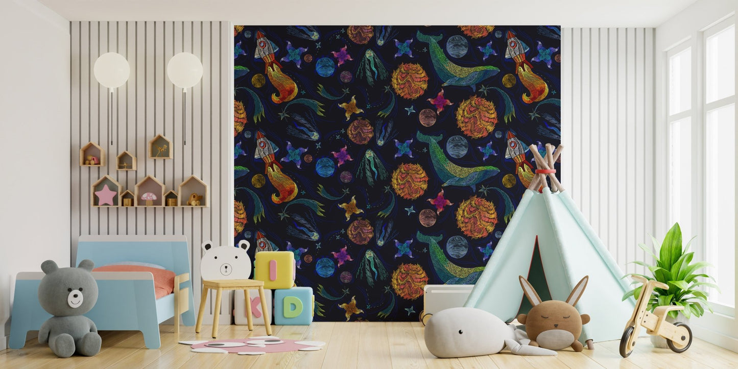 Navy blue space adventure wallpaper with colorful cosmic shapes in a modern kids bedroom.