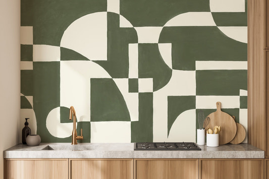 Scandi style wallpaper with dark emerald green and white abstract shapes.