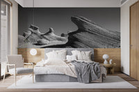 Emirates Rock Marvel Wall Murals behind a white bed in a minimalist bedroom