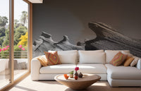 Monochrome rock landscape wall mural in a modern living space with balcony view