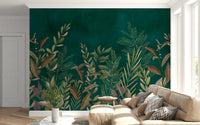 Dark green botanical wall mural behind a tan sectional in a modern living space