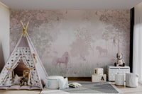 Mythical unicorn wall mural with pastel pink flowers and green meadow grass.