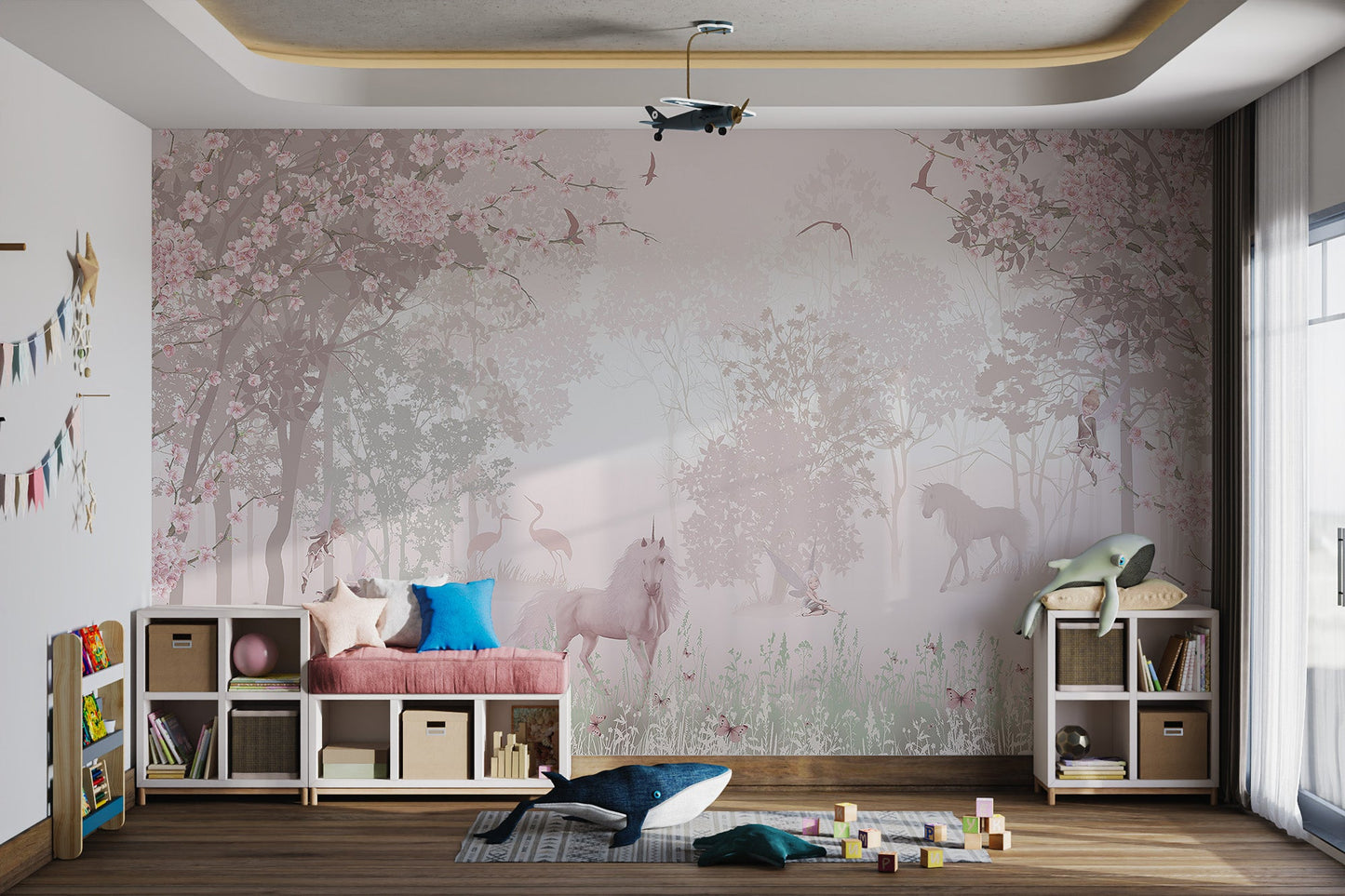 Pink forest wall mural featuring fairies and flying birds in a kids playroom.