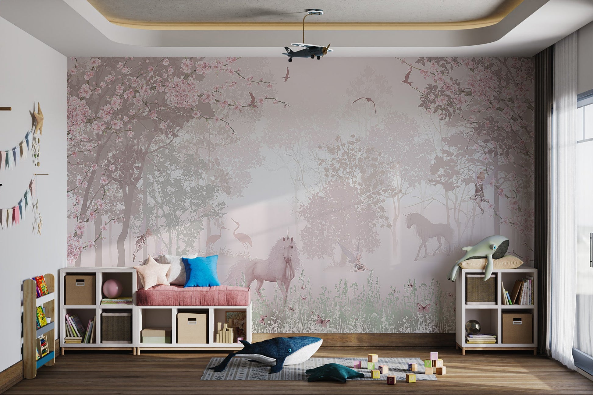 Pink forest wall mural featuring fairies and flying birds in a kids playroom.