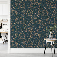 Elegant esoteric wallpaper with moon and floral motifs in hallway.