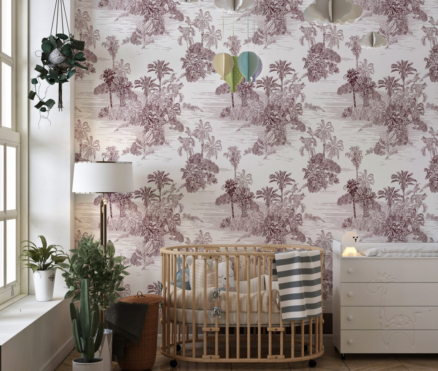 Nursery room wallpaper with vintage brown jungle sketches and a wooden crib.