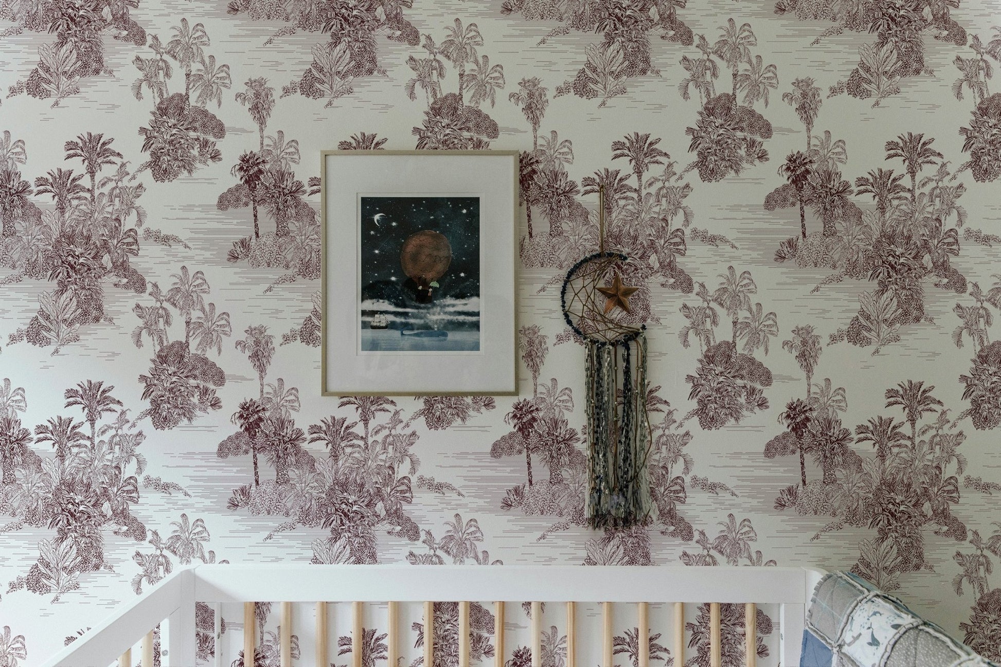 Detailed botanical wallpaper with brown palm tree sketches and a wall frame.