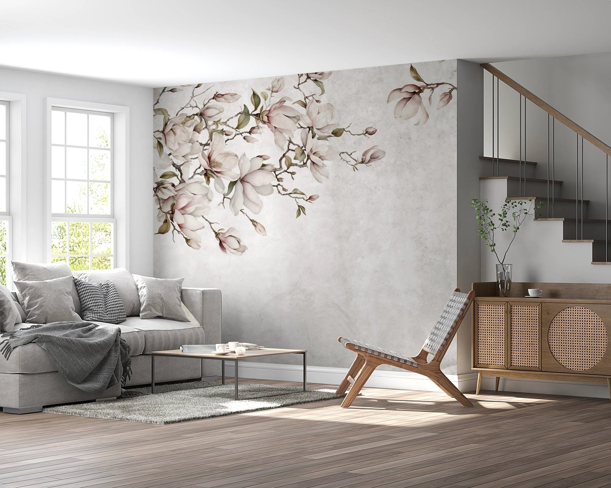 Minimalist living area with grey sofa and  ethereal floral branch wall mural