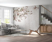 Minimalist living area with grey sofa and  ethereal floral branch wall mural