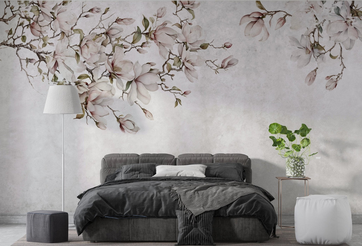 Bedroom with black bedding and pink floral blossom wall mural.