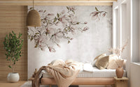 Cozy bedroom with beige decor and magnolia blossom wall mural.