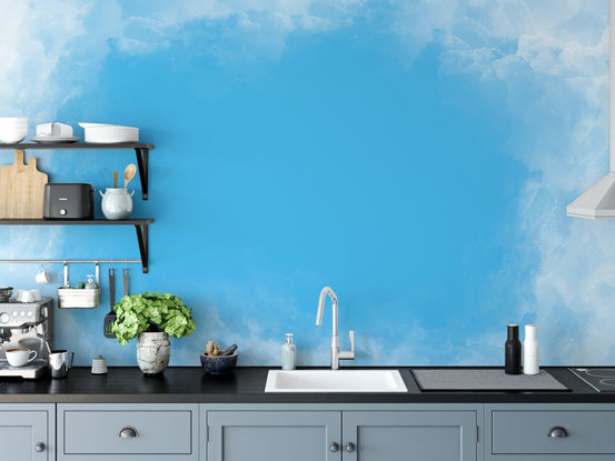 Abstract cloud wall mural with soft gradient blue wallpaper.