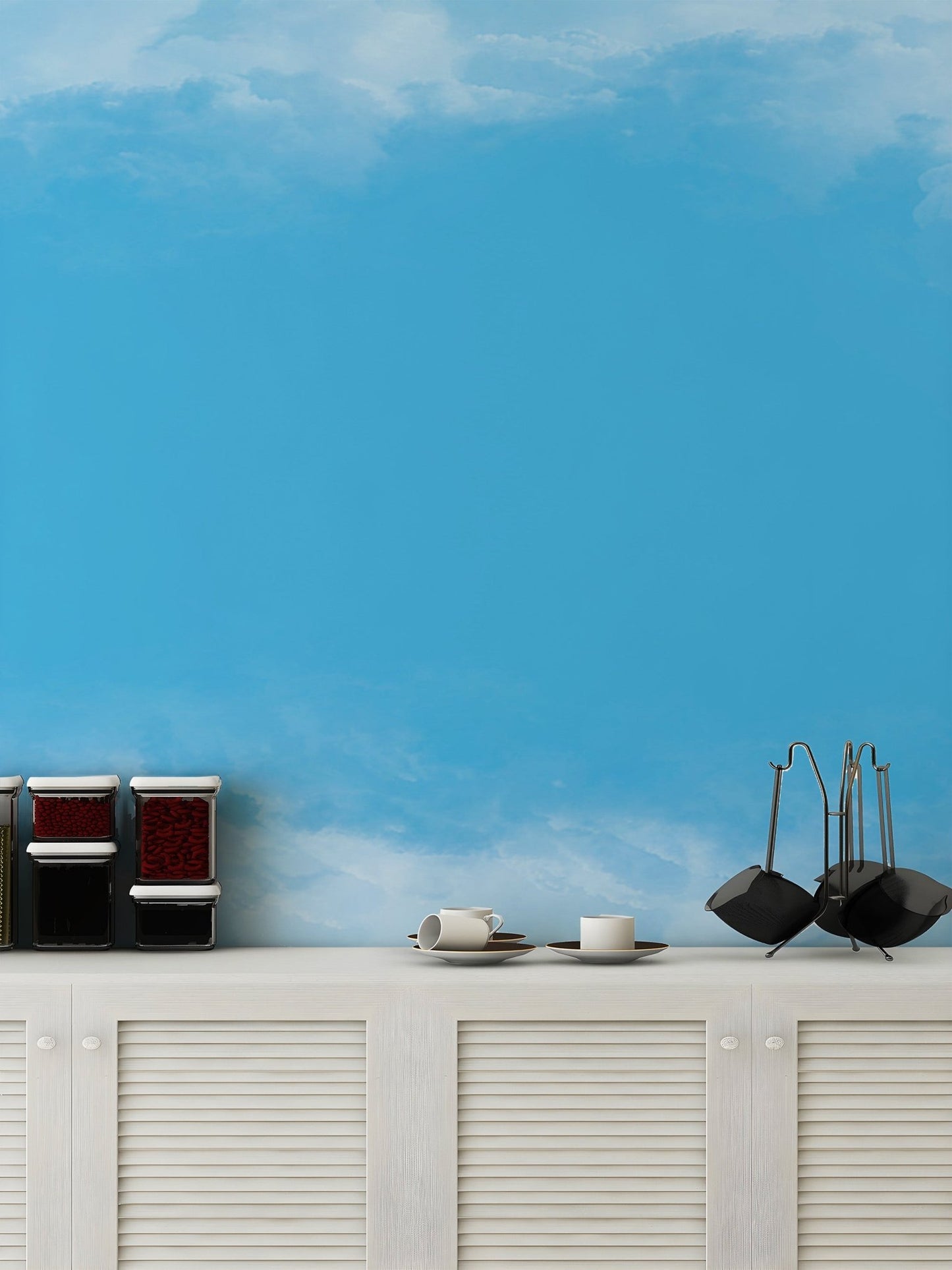 Dreamy sky wallpaper mural in pastel blue color tones.