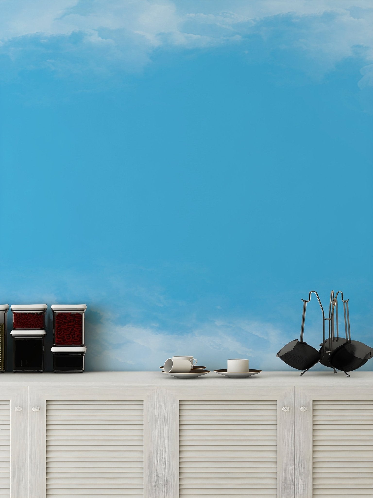 Dreamy sky wallpaper mural in pastel blue color tones.