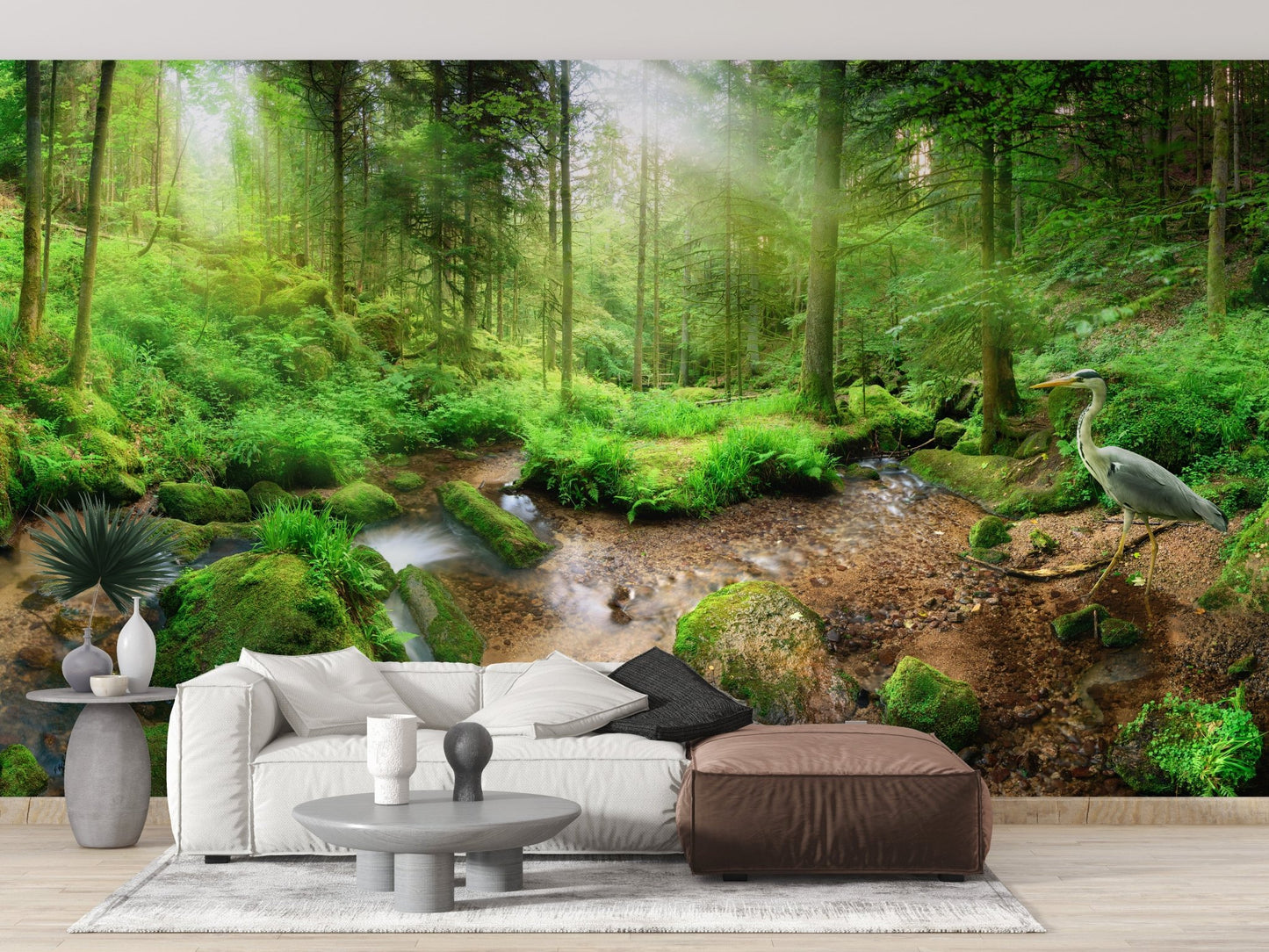 Ethereal Heron in Green Paradise Murals behind a modern couch and coffee table.