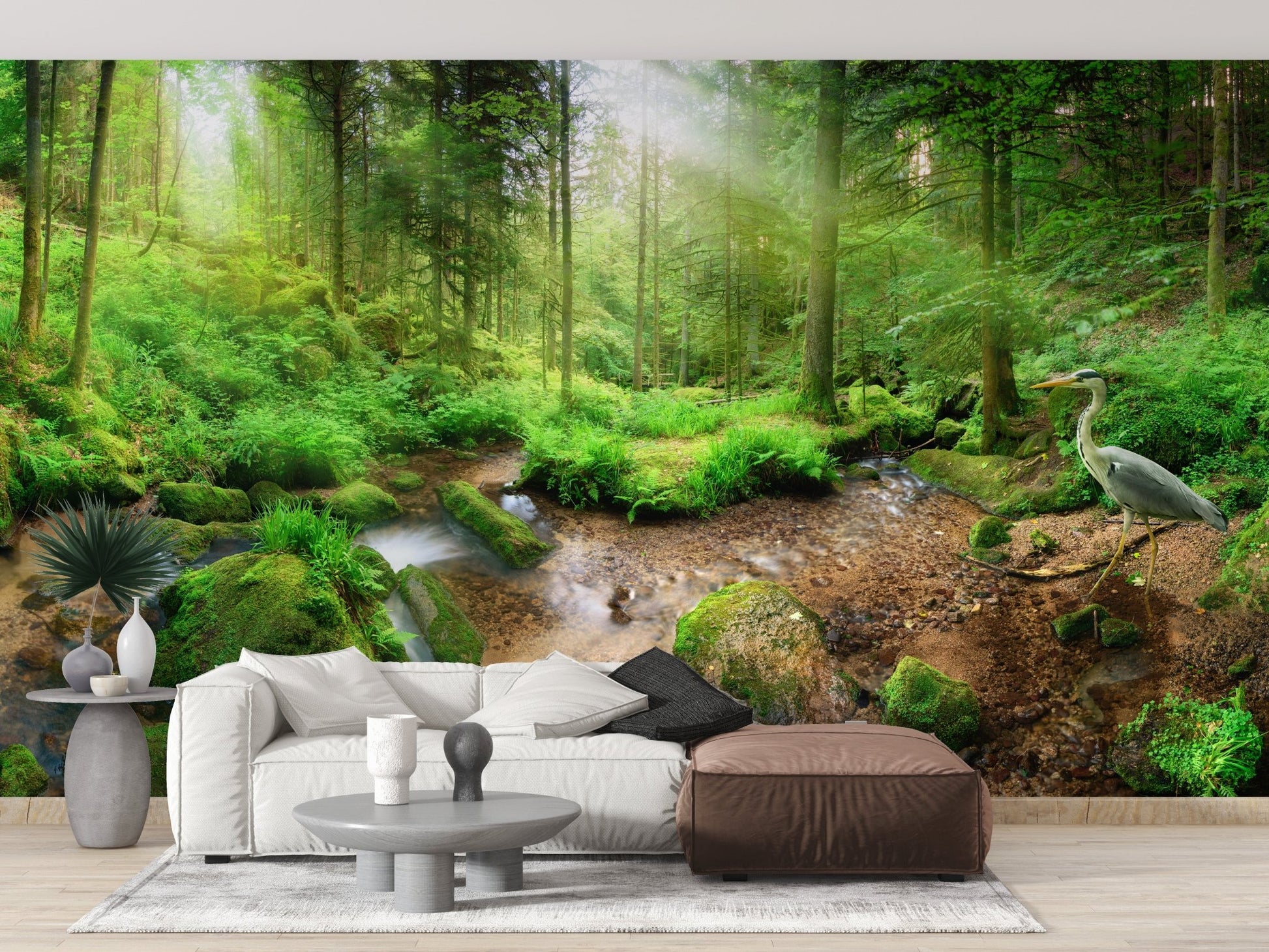Ethereal Heron in Green Paradise Murals behind a modern couch and coffee table.