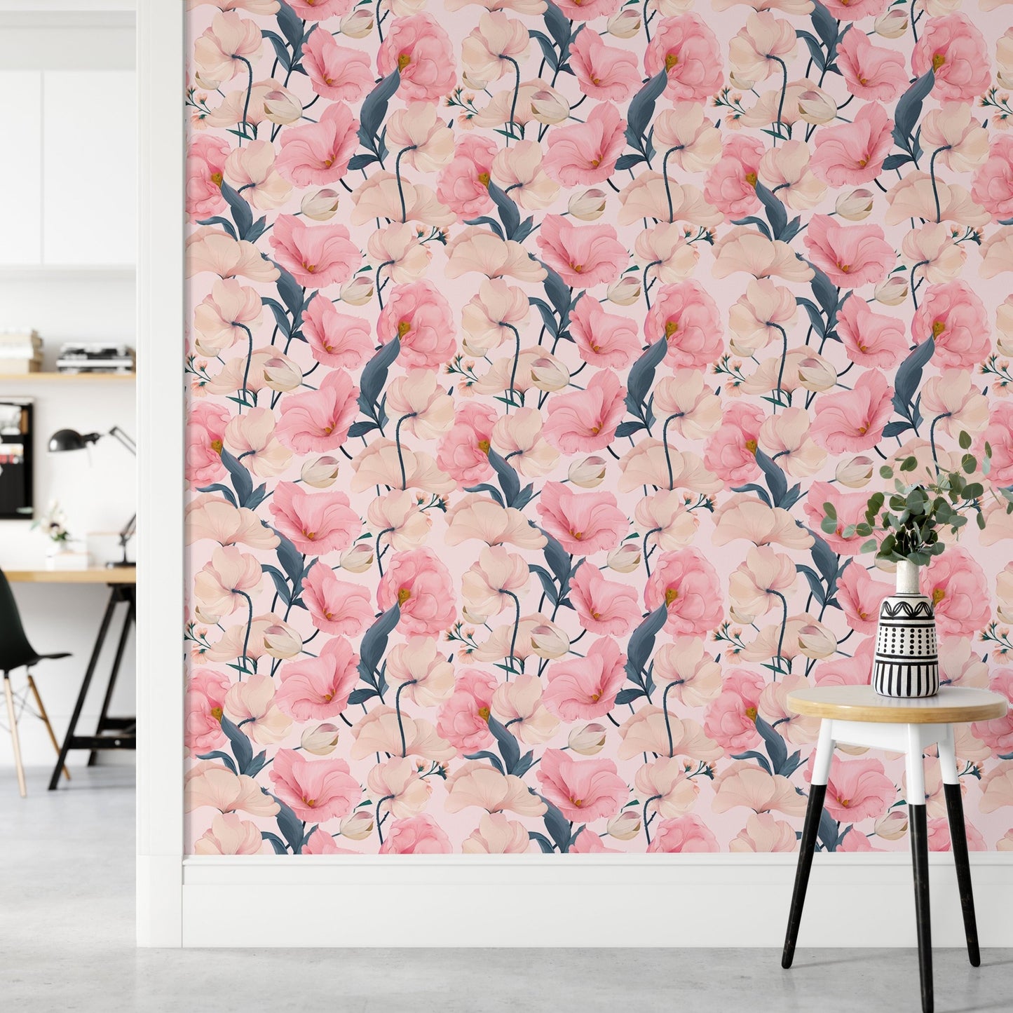 Pink flower wallpaper in a hallway with a small marble side table.