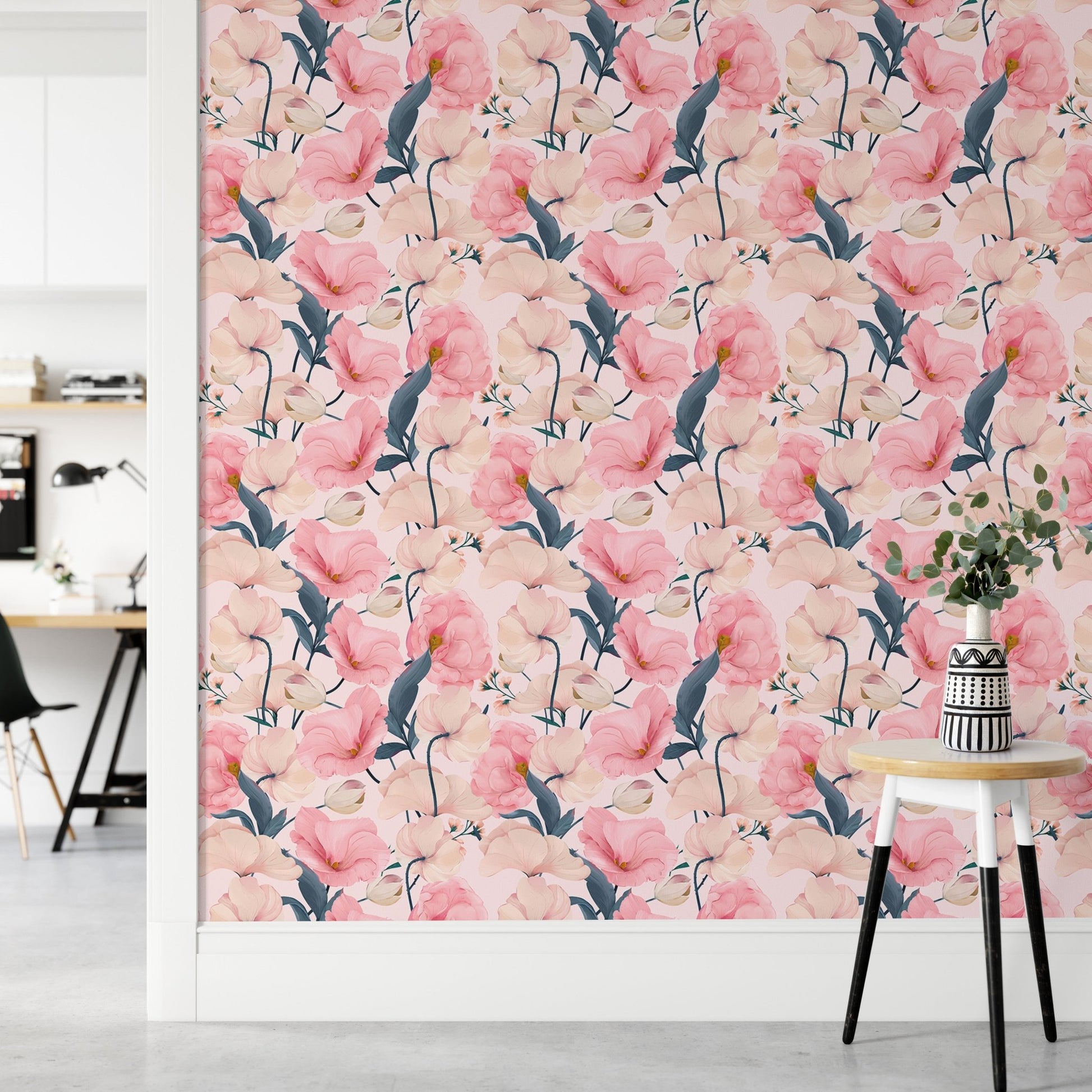 Pink flower wallpaper in a hallway with a small marble side table.