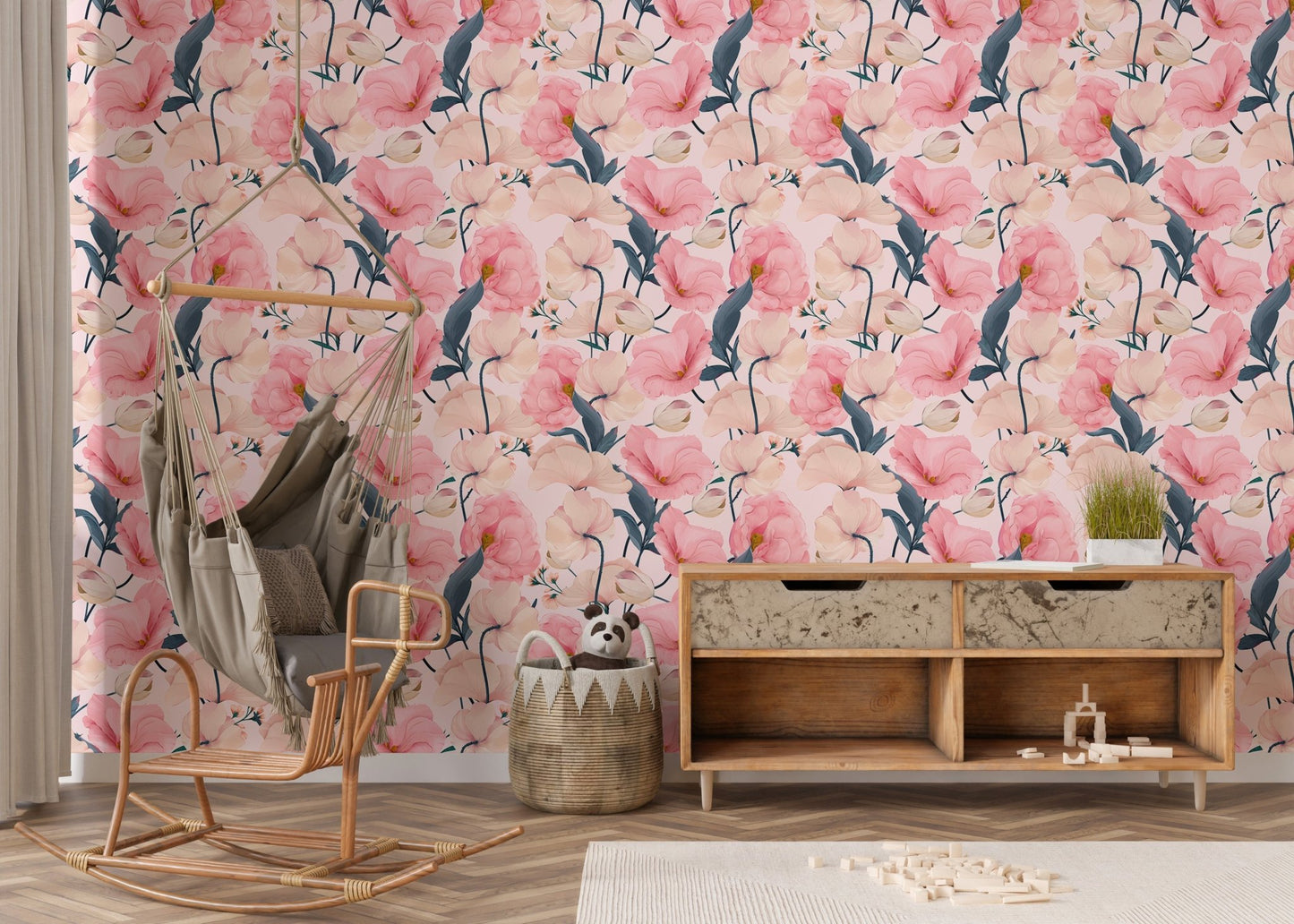 Eustoma pink floral wallpaper in a nursery with a wooden sideboard and rocking chair.