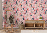 Eustoma pink floral wallpaper in a nursery with a wooden sideboard and rocking chair.