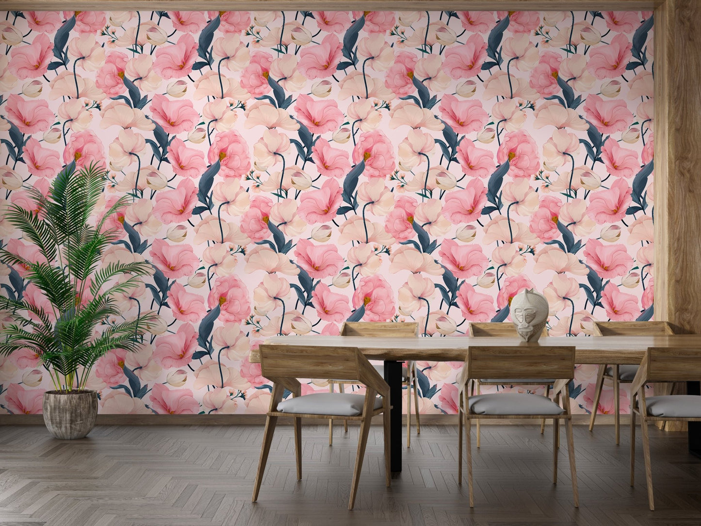 Watercolor flower wallpaper in a dining room with a wooden table and chairs.